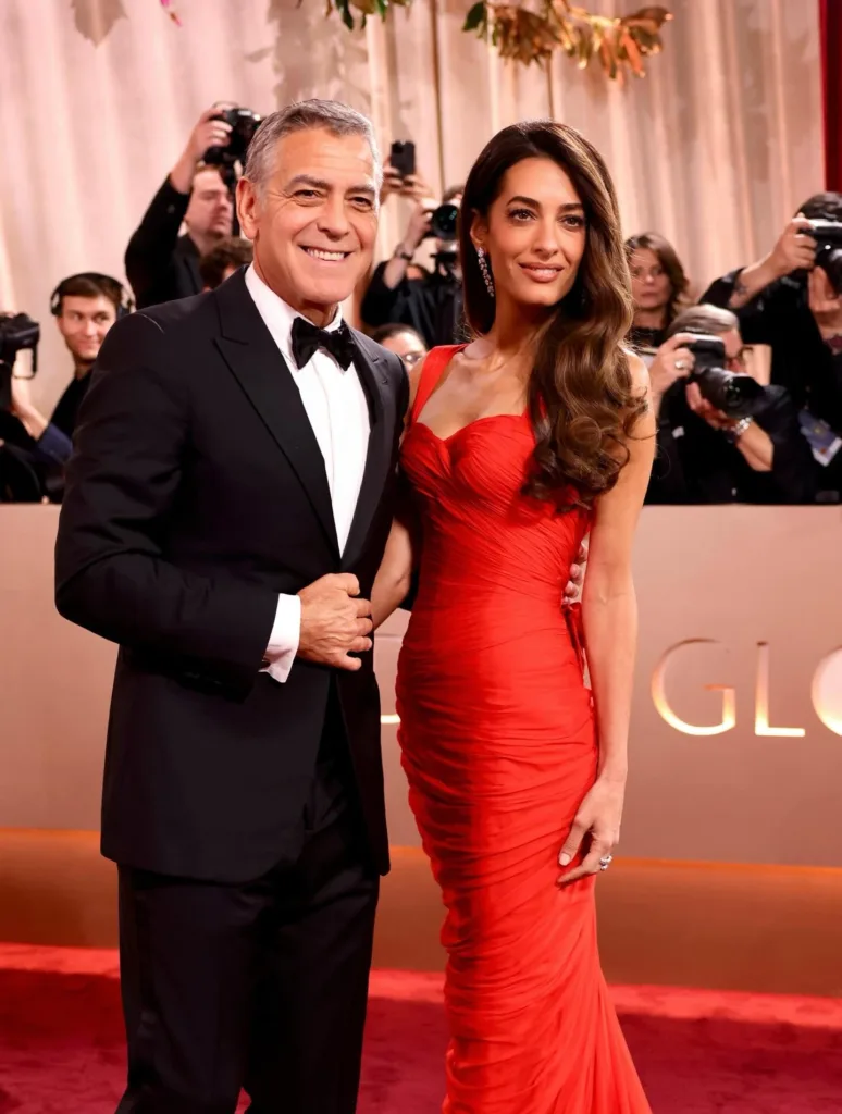 أمل كلوني تتألق بجمال ناعم وفلسفة أناقة راقية